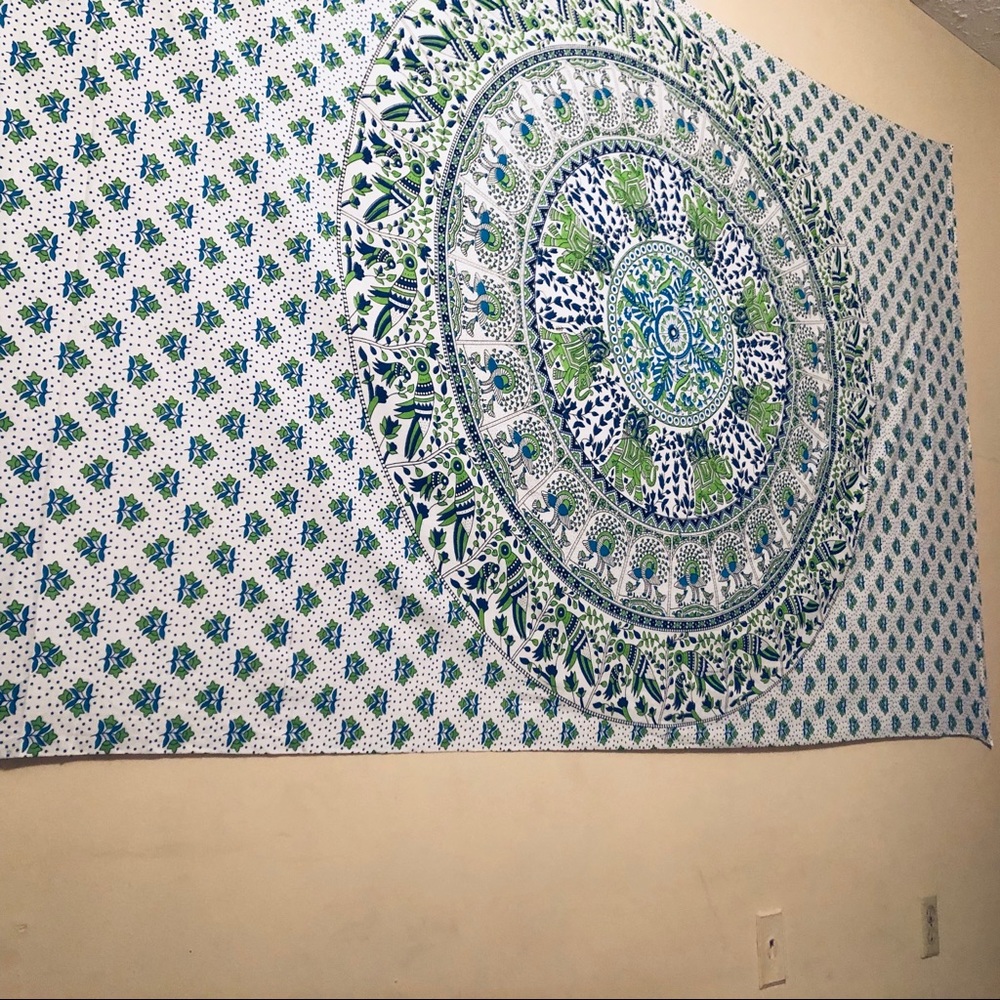 A blue and green tapestry